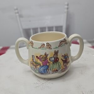 Vintage Royal Doulton Bunnykins Double Handle Bone China Tea Cup Trying On Hats